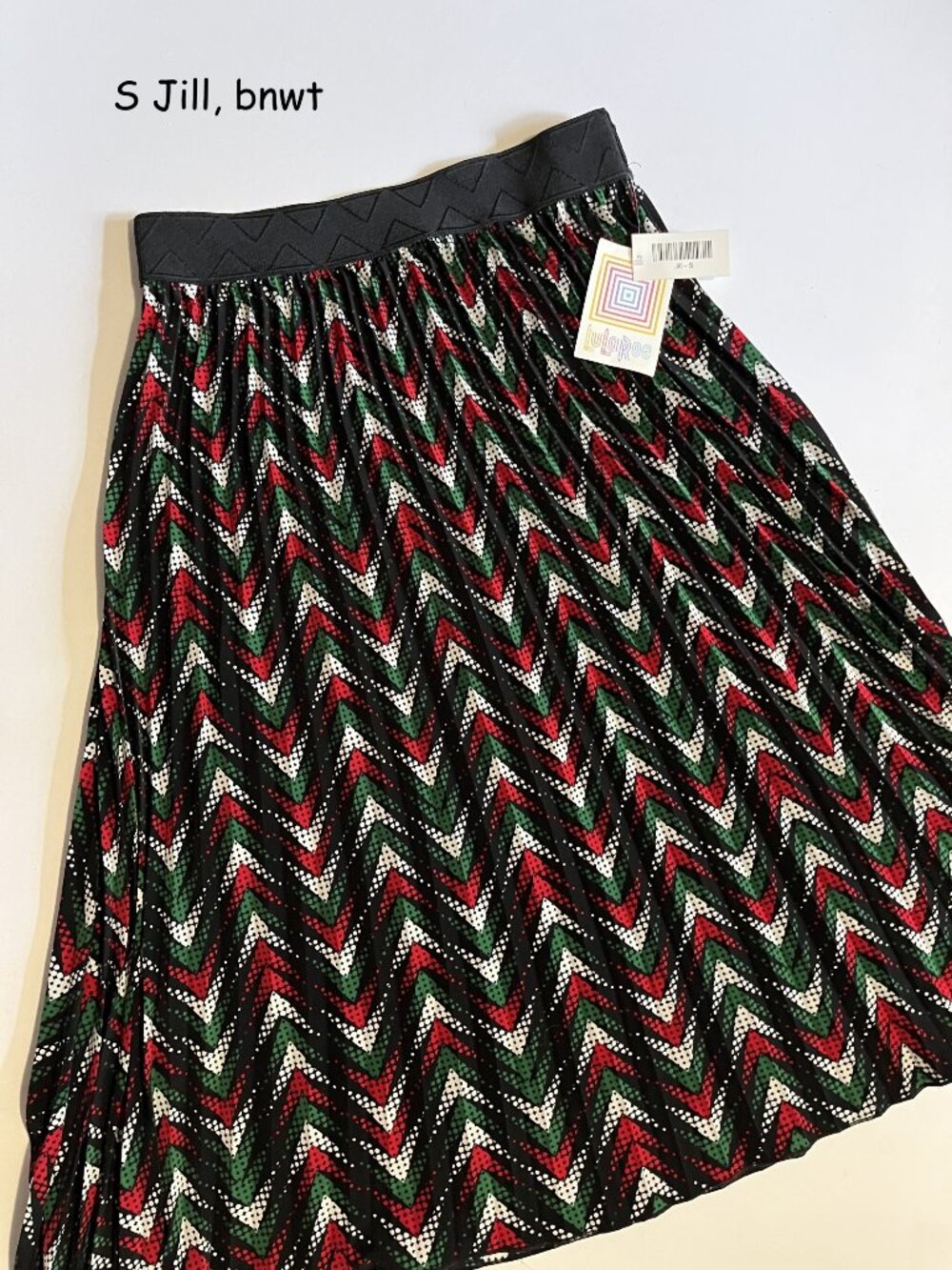 Small Lularoe Jill pleated skirt, red, green, black, white zigzags